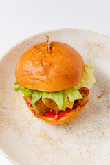 burger on the white plate