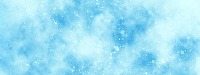 Abstract light blur defocused blue background with bokeh, Beautiful winter background of snow floating into air randomly, light blue bokeh background for wallpaper, invitation, cover and design.