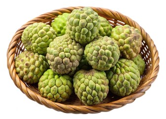 Fototapeta premium A wicker basket full of fresh green custard apples
