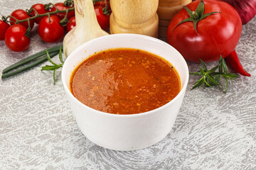 Hot tomato soup with diced chicken