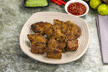 Grilled beef barbecue with spises