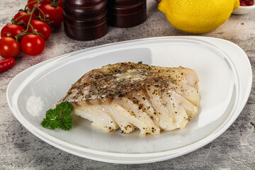 Baked cod fish fillet with spices