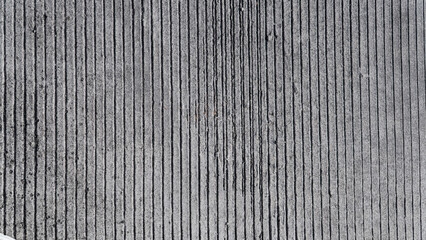 Gray cement road texture, marked with linear patterns