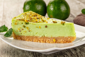 Green pistachio cheesecake served mint