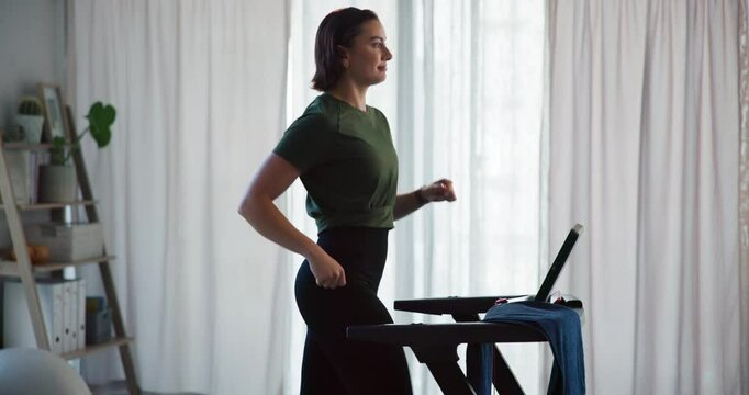 Fitness, woman and running on treadmill in home for cardio exercise, wellness challenge and burning calories. Morning routine, athlete and workout on machine for weight loss, healthy body or training