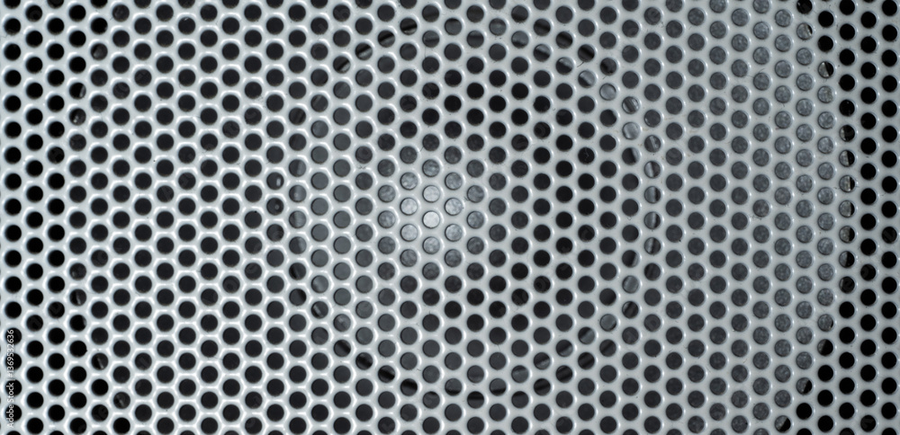 Aufkleber a close up of a speaker with a mesh pattern