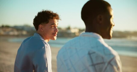 Men, friends and talking on beach outdoor for summer vacation, ocean travel and bonding. People, discussion and pointing for holiday destination, calm morning and weekend break with tropical getaway
