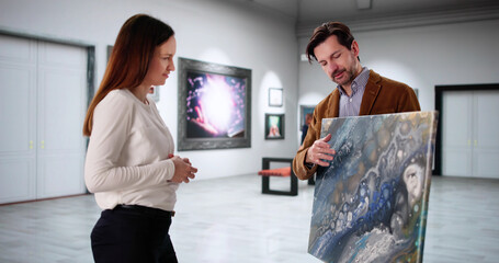Two Young Artists Browse Modern Art Gallery