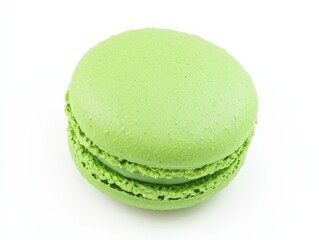 A close-up of a vibrant pistachio-flavored macaron, capturing the delightful details of its texture, color, and tempting appearance.
