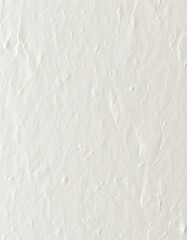 Fototapeta premium Close-up of artisan paper, showcasing its textured surface and subtle color variations, weathered, abstract