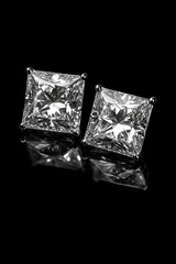 Fototapeta premium A pair of square-shaped white diamonds,