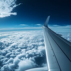 Fototapeta premium A view of an airplane flying above the clouds