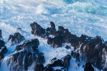 Powerful storm waves in Porto Moniz, on the Madeira Atlantic coastline, Portugal