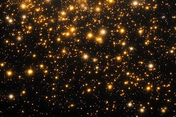 Naklejka premium Golden glittering sparkles on dark background. Festive shiny gold dust texture for holidays