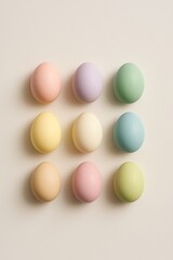 Pastel Easter Eggs Aligned in Minimalist Grid on Neutral Background


