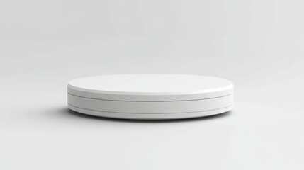 A minimalist white circular platform is centered in the frame