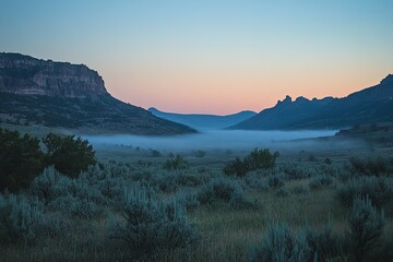 Obraz premium Morning landscape with mountains valley and thick fog coverage