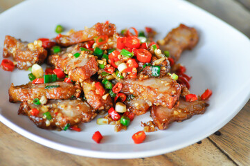 stir fried pork or deep fried pork , fried pork or crispy pork