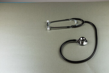 Stethoscope placed on a clean surface for medical use
