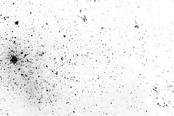 Obraz premium Grunge texture background with black paint splatters on white surface for design projects