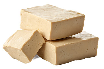 A close up shot featuring three blocks of firm tofu stacked on top of each other against black background