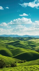 Fototapeta premium Serene Natural Landscape with Rolling Green Hills and Blue Skies