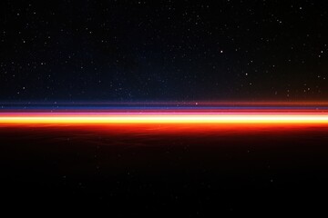 Obraz premium Horizontal Streak of Light with Red and Blue Glow on Black