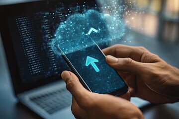 Mobile data transfer to cloud computing.  Hands hold a smartphone with an upward arrow symbol, visualizing data upload to a cloud.  A laptop is in the background with code visible