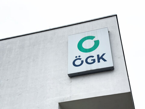 Ogk healthcare building exterior with logo sign in urban setting