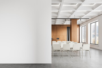 Modern conference room with empty white wall for mockup. 3D Rendering