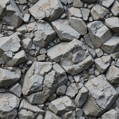 Fototapeta premium The background is a dense pattern of gray stones of various shapes and sizes. The textured surface with cracks and chips creates an interesting visual effect.