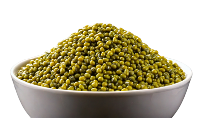 A white bowl filled with a mound of uncooked mung beans is shown against a transparent background png
