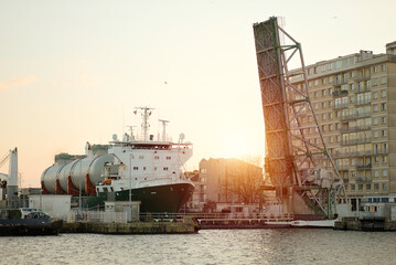 LNG Tanks Transportation On Deck Of Heavy-Lift Vessel, Heavy Load Carrier Entering The Basin Through The Lock © I am from Mykolayiv