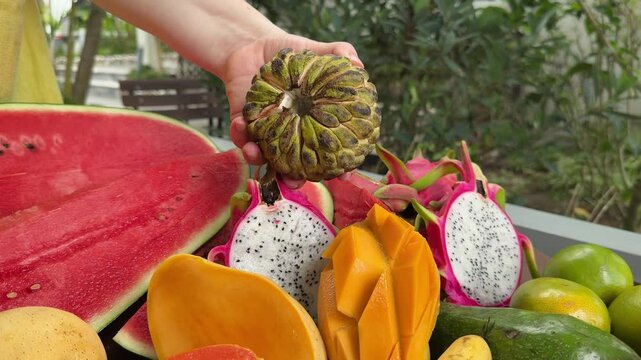 Annona fruit sugar apple Ripe Custard Apple or Sweetsop Fruit with Green Leaves Rotating on White Background and Copy Space, Also Known as Sugar Apple