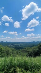 Fototapeta premium Lush green hills under a bright blue sky