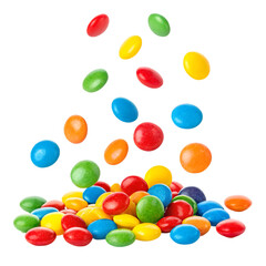 Colorful candies scattered and falling in a vibrant display. white background