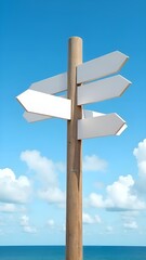 direction signpost on the beach with blank road sign board, white arrow panels on blue  sky background, destination guidance