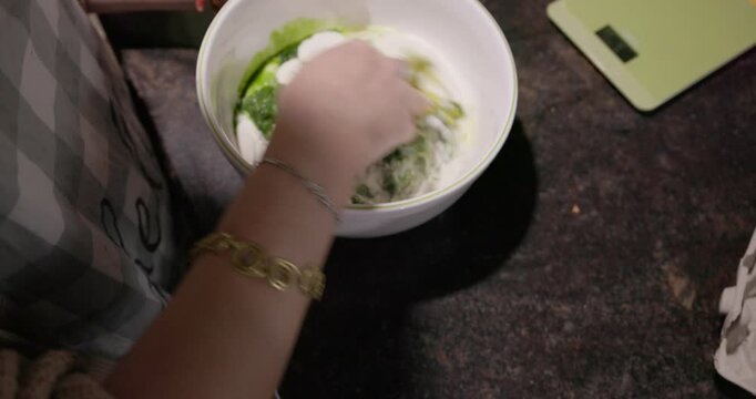 Making green dough from wild bear garlic