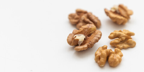 Half a walnut isolate. Peeled walnut on white. Walnut top view. Set with clipping path. Full depth of field