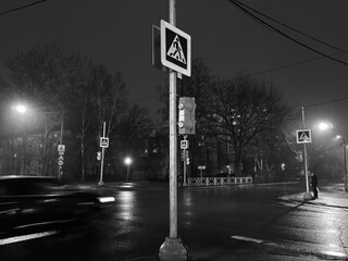 night city car intersection, danger on the roads when following traffic rules