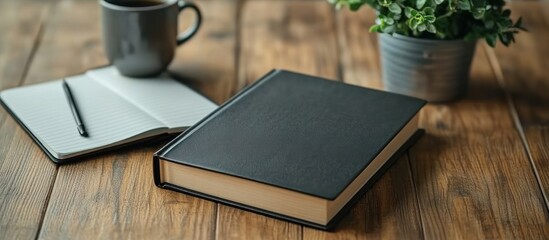 Fototapeta premium Book, notebook, coffee, plant, wooden table