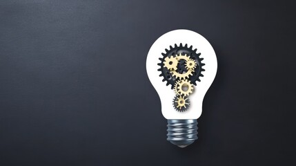 Lightbulb with Gears Concept on Dark Backdrop, innovation ,ideas