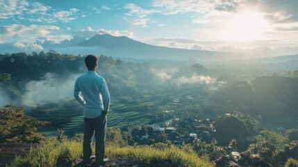 Contemplating vast terraced landscapes and majestic mountains beyond horizon