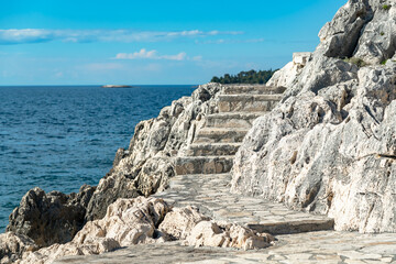 well-maintained descent to the water in the city of Rovinj. stone steps on the rocky shore 
