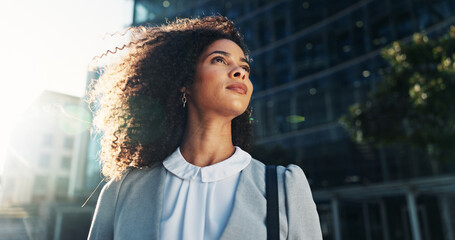 City, hope and thinking with business woman outdoor for idea, inspiration or travel. Building,...