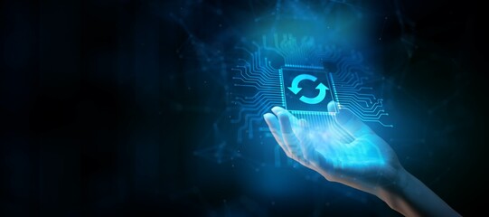 Update Concept: Maintaining Current Information Illustrated on a Processor Touched by a Human Hand.