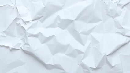 Obraz premium Crumpled wrinkled paper texture with creases and rough patterns