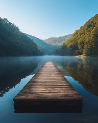 Obraz premium Serene morning mist, wooden dock, calm lake, tranquil mountains, peaceful nature