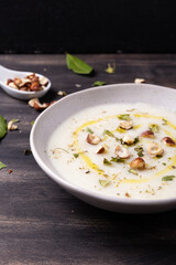 Cauliflower soup with hazelnuts and aromatic herbs. Wnter comfort food and plant based