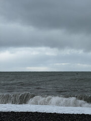 Stormy ocean with dark clouds and rough waves